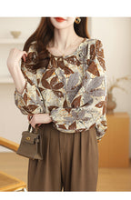Load image into Gallery viewer, Floral round neck chiffon nine-quarter sleeve retro printed shirt
