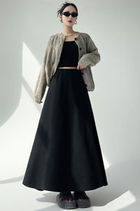 Black knitted pleated high-waisted A-line umbrella skirt with large hem