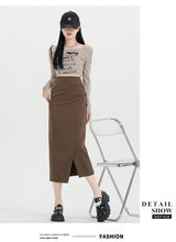 Load image into Gallery viewer, Autumn and winter niche irregular slit high-waisted hip-covering A-line skirt
